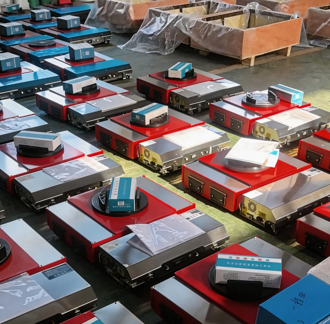Nieuwe robuuste, duurzame elektrische palletwagen voor de bouwplaats, geschikt voor het hanteren van zware lasten, met een capaciteit van 10-120 ton, stalen en rubberen wielen.